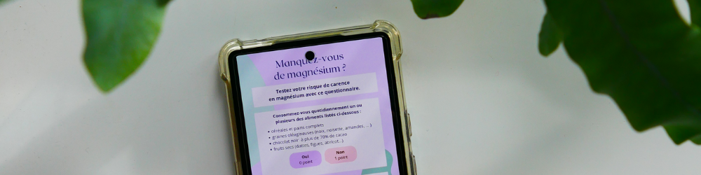 Photographie d'un téléphone avec le test pour savoir si on manque de magnésium affiché.